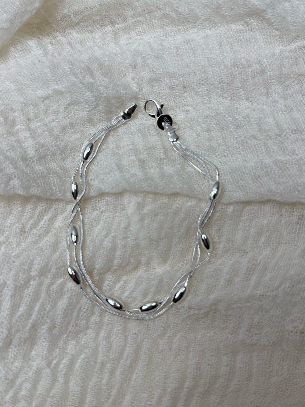 Elegant Silver Multi-Strand Bead Bracelet